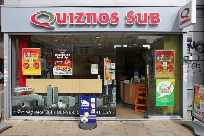 Quiznos Sub fast food restaurant in London. Quiznos is a sandwich shop franchise with 1,500 U.S. shops and 600 international locations.