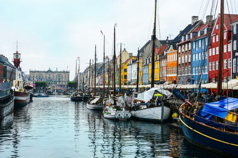 Copenhagen Nyhavn (New Harbour), in Copenhagen, Denmark. New port of Copenhagen. Colorful old town architecture. Copenhagen style, European street