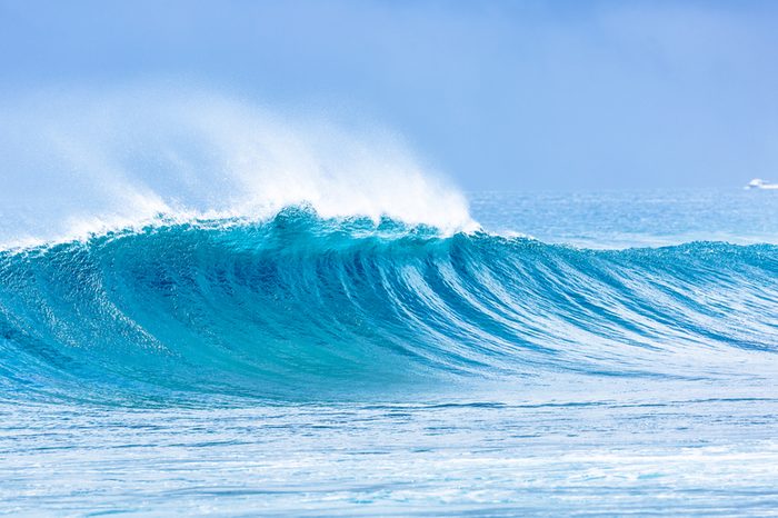 Beautiful panorama of splashing blue wave curl.