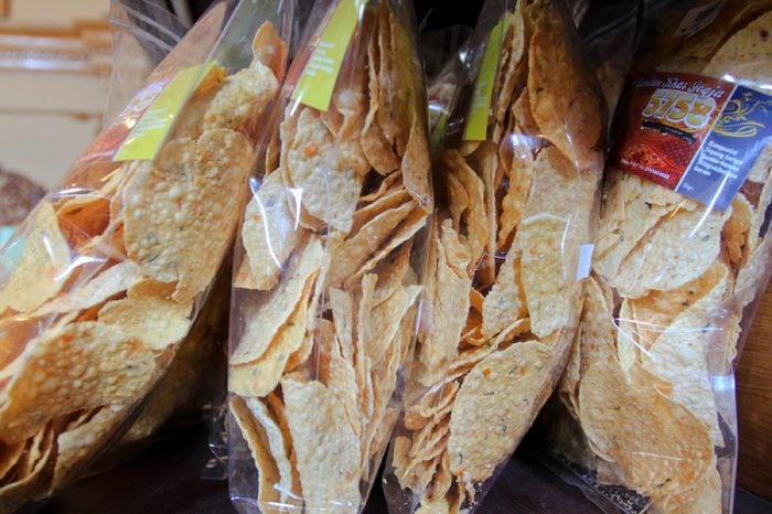YOGYAKARTA 2013 - Store in Yogyakarta selling keripik tempe or tempe crispy chip in a plastic bag during June holiday season