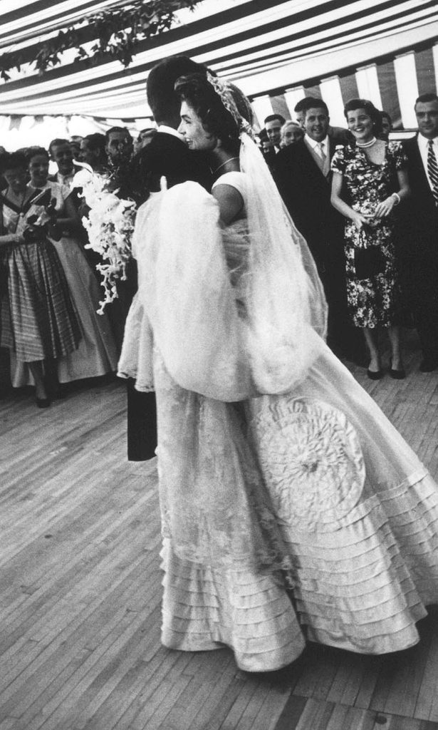 John F. Kennedy and Jacqueline Bouvier dancing at wedding