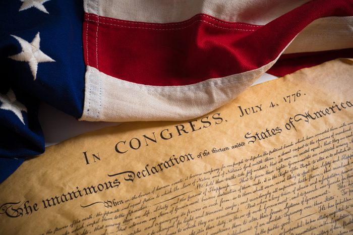United States Declartion of Independence with vintage flag. July 4th.