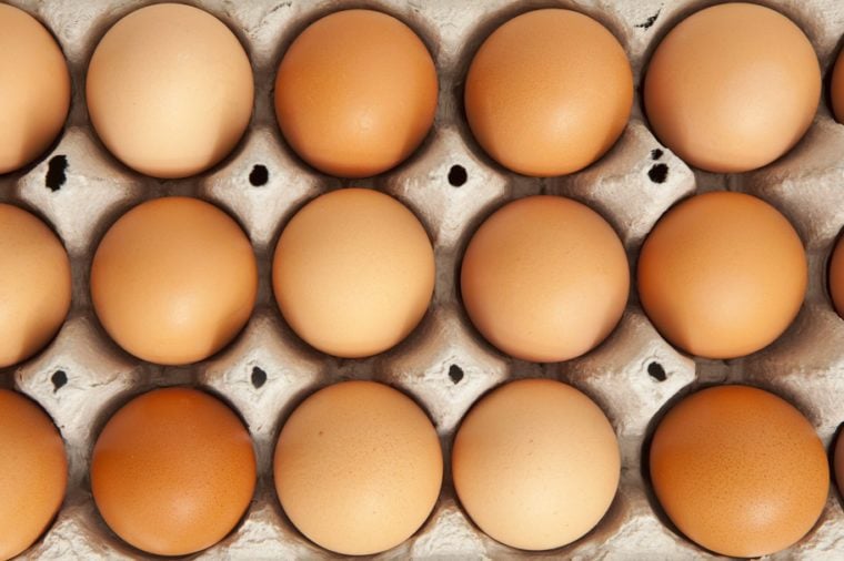 top view of organic eggs in a protective container