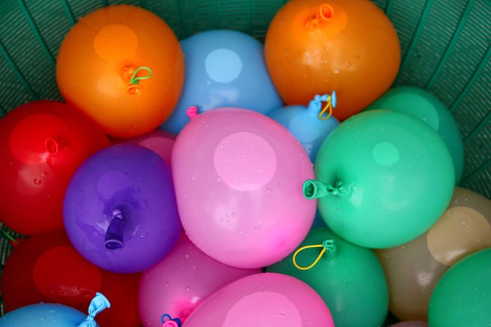 colorful water balloons in the basket prepare for games. 