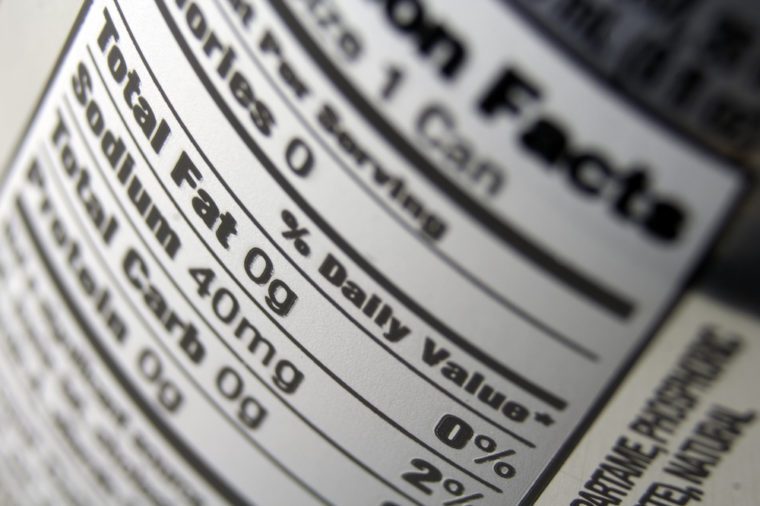A close up of a nutritional value label on the back of a soda can