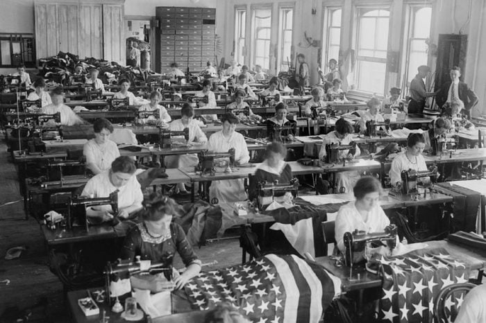 Women sewing American Flags at the Brooklyn Navy Yard, c. 1916-1920