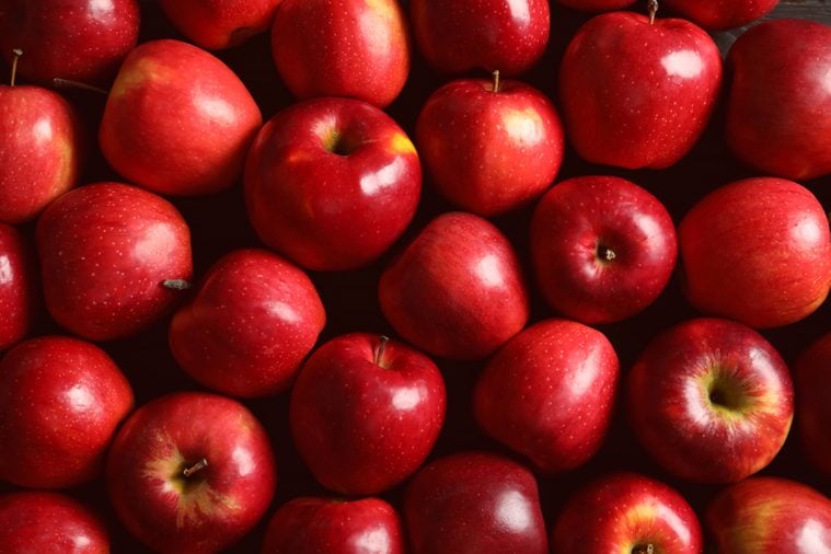 Fresh ripe red apples as background