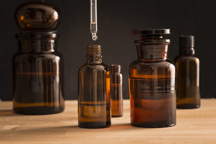 Old style medicine glass bottles. Concept of science research, healthcare and laboratory tests.