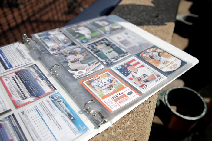 A trading card showing Tim Tebow's likeness in a Florida football uniform is seen with other trading cards from a child prior to the Eastern League All-Star minor league baseball game, in Trenton, N.J