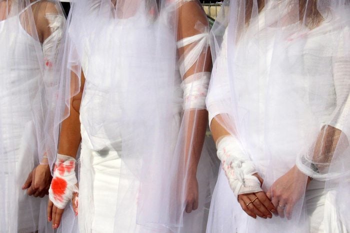 Activists From the Lebanese Ngo Abaad (arabic For Dimensions) a Resource Center For Gender Equality Dress As Brides and Wearing Injury Patches During a Protest Against Article 522 in the Lebanese Penal Code at Downtown Beirut Lebanon 06 December 2016 According to the Article Rapists Are Obligated to Marry Their Victims to Avoid Prosecution Which is Still Practiced in the Conservative Part of the Country and Especially Among Families Whose Priorities Are Headed by Preserving the Family's So-called 'Honor' Lebanon Beirut