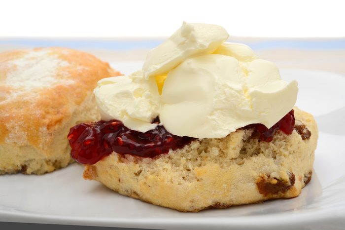 Fruit scone with raspberry jam and cream