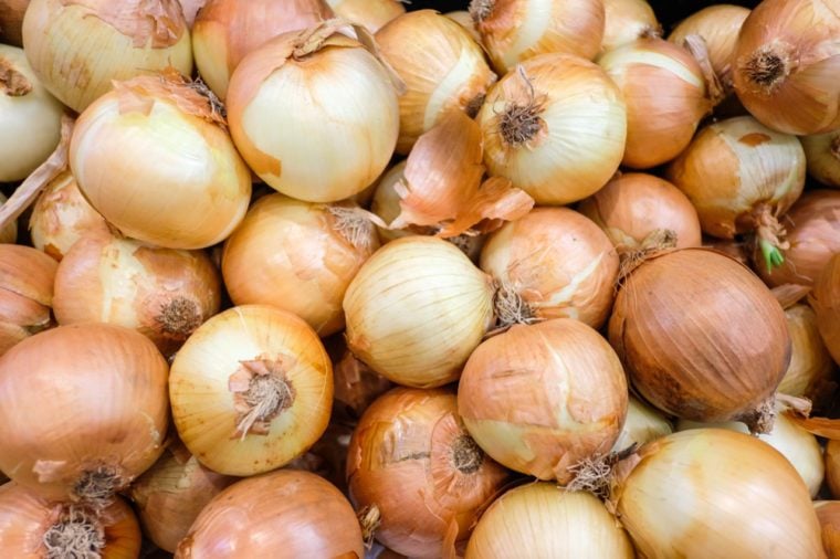 Fresh onions. Onions background. Ripe onions. Onions in market.selective focus.JPG