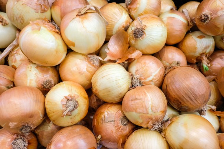 Fresh onions. Onions background. Ripe onions. Onions in market.selective focus.JPG