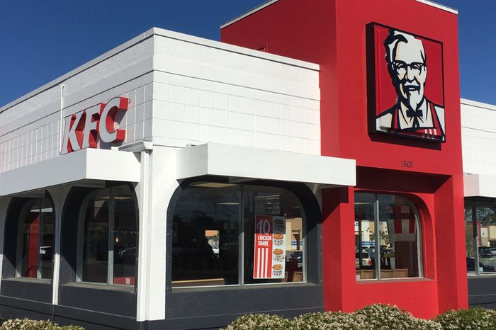 KFC Kentucky Fried Chicken retail restaurant store front with Colonel Harland David Sanders logo portrait sign Saint Augustine, Florida USA. March 8, 2018