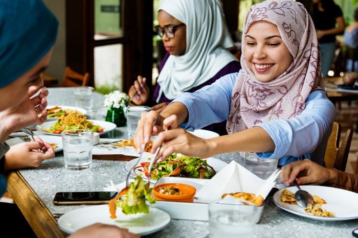 Muslim women hijab having dinner