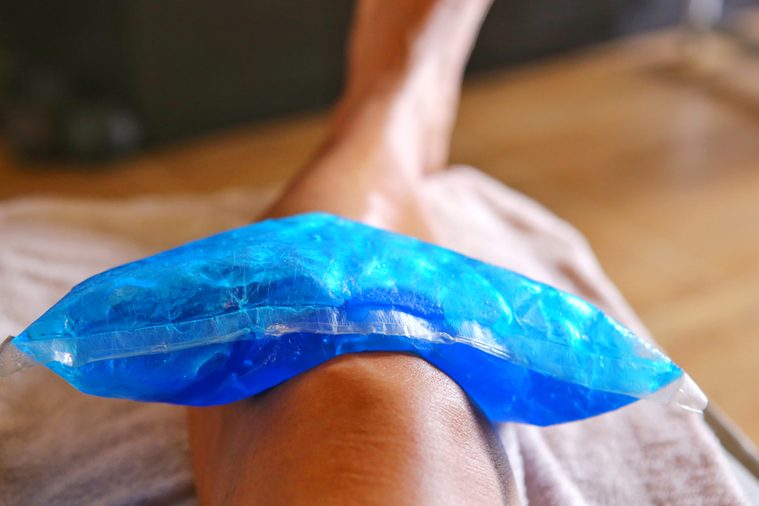 Use a cool bag to treat a knee injury.