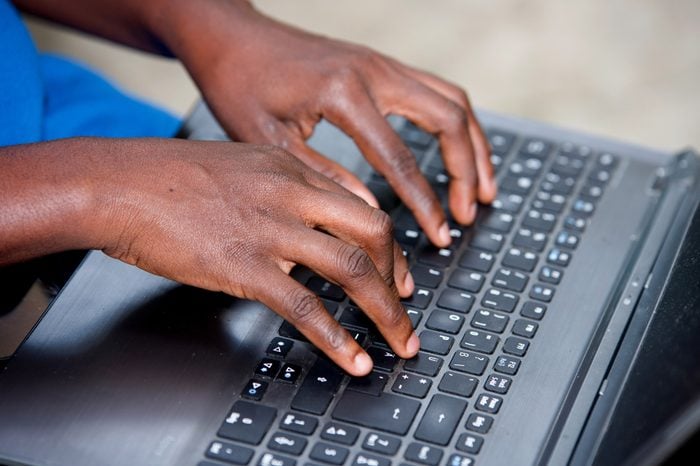 female hands typing keyboards.