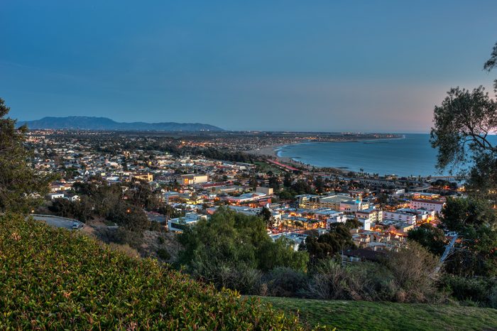 Coastal town of Ventura illuminated by street lights.