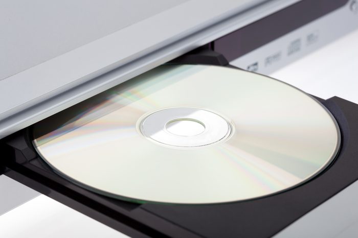 Close up of a DVD player ejecting disc
