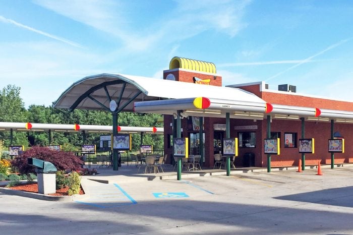 Exterior of a Sonic Drive In restaurant. Sonic is an American chain of restaurants featuring car hops.