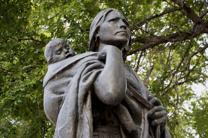 BISMARCK, NORTH DAKOTA - July, 31, 2016: Statue of Sacagawea and her son Jean-Baptiste Charbonneau, guide on the Lewis and Clark expedition, Bismarck, North Dakota
