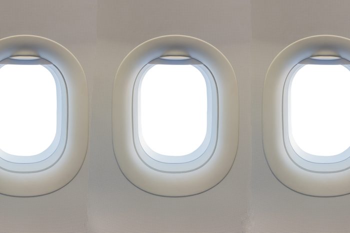 image of window on airplane with white color blank space.