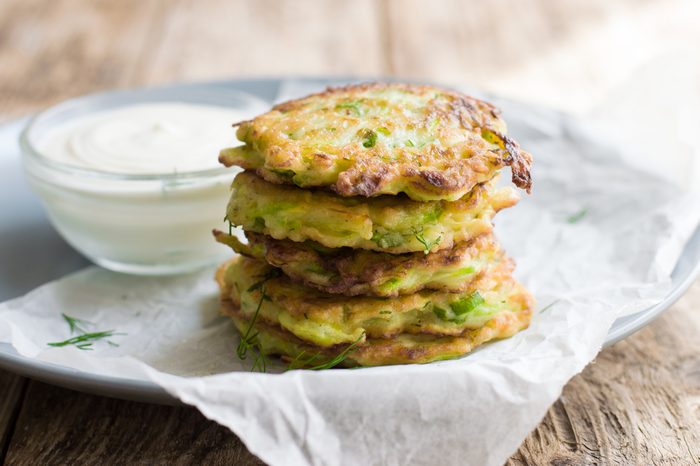 Fritters from courgettes (zucchini). Vegetable vegetarian cutlets or fritters.