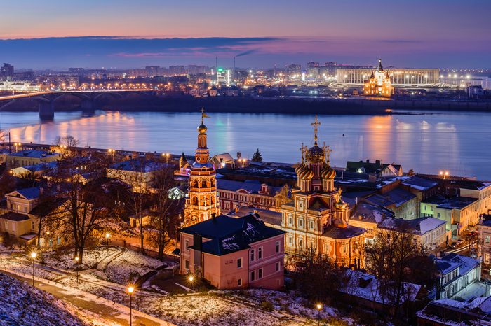 Beautiful panoramic view of the evening city near Kremlin with the Stroganov Church and Oka river. Nizhny Novgorod city, Russia.