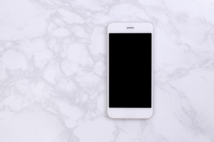 White mockup smartphon on marble background