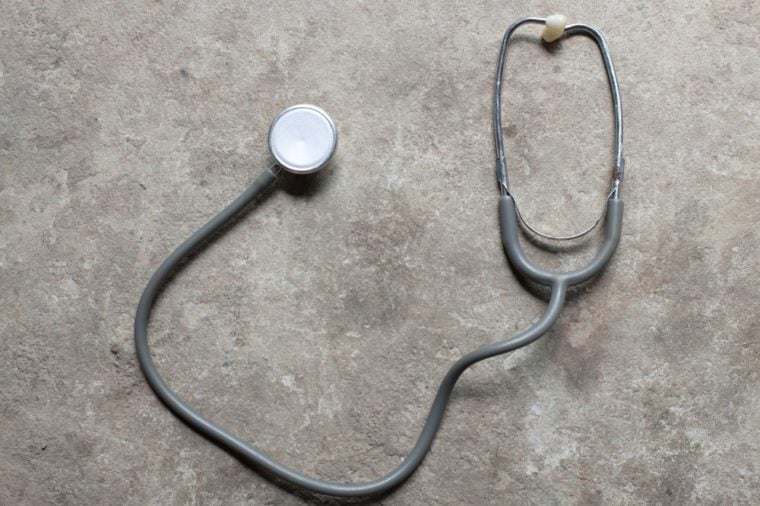 Stethoscope on gray background