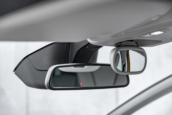 Modern car driver and child rear-view mirror