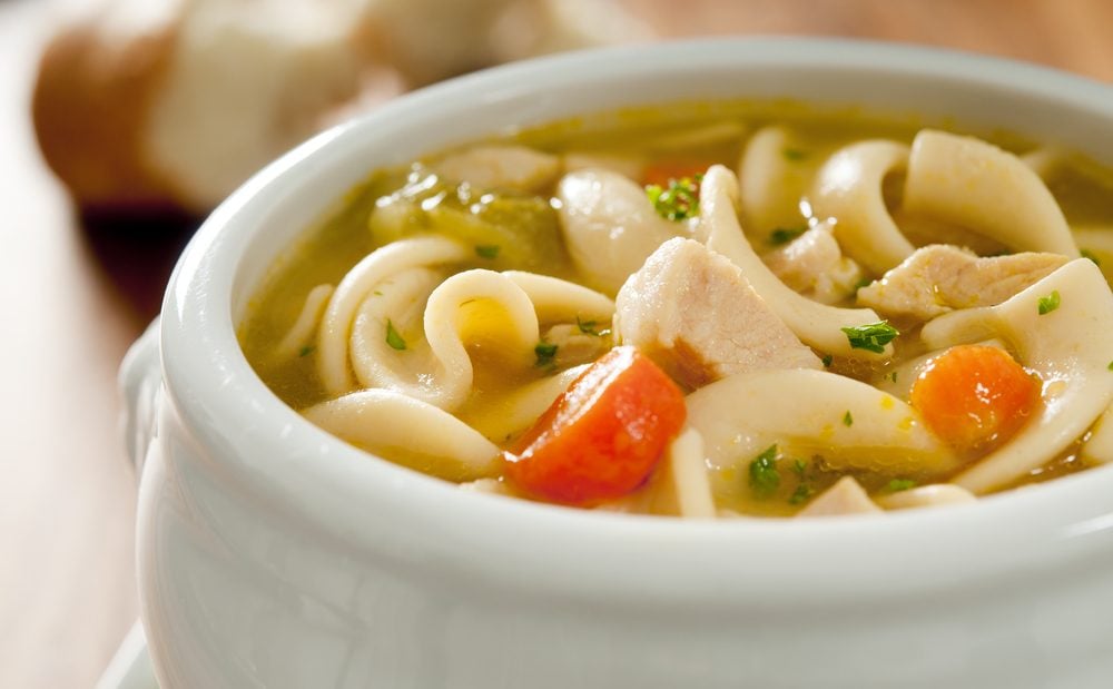 Closeup of chicken noodle soup.
