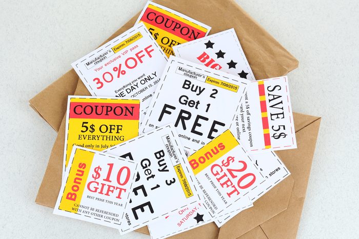 Set of cut coupons for shopping to save money, isolated on white