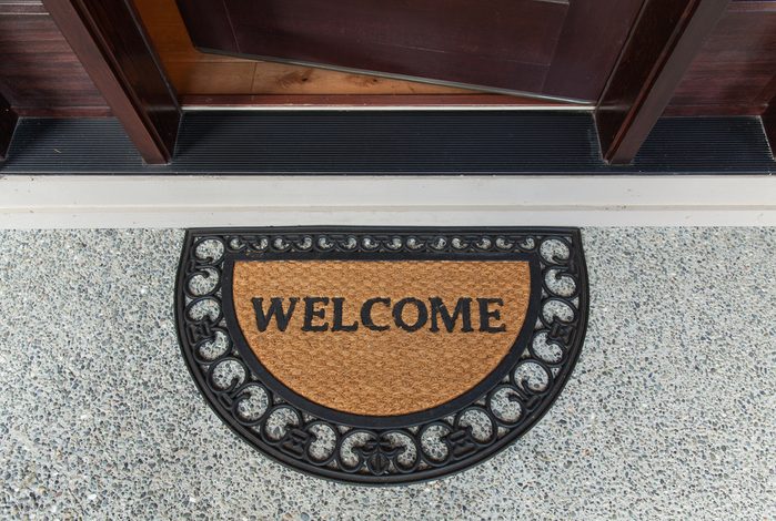 Welcome door mat with open door 