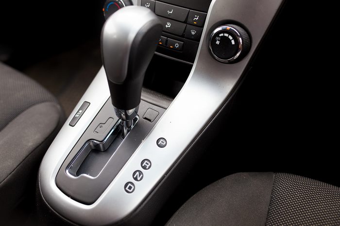 Automatic gear stick inside modern sport car. Luxury and expensive concept.