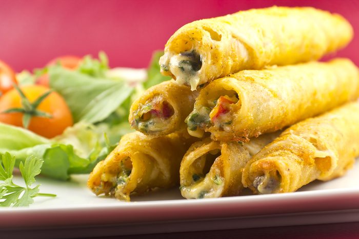 Authentic Mexican Taquitos with a fresh garden salad