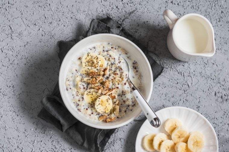 Coconut milk sweet quinoa porridge. Healthy breakfast. Top view, flat lay 