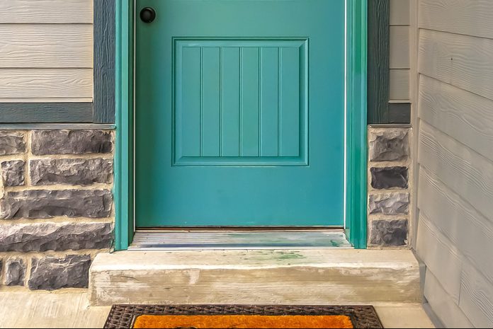 bottom of a blue front door