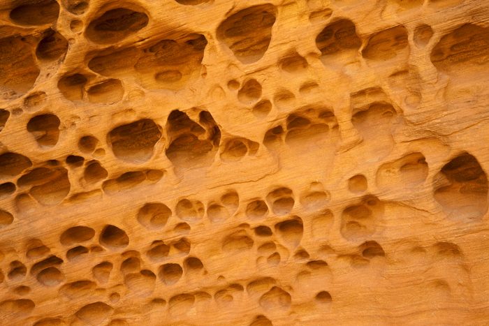 Optical illusion, eroded holes in the rock, Little Wild Horse Canyon, Slot Canyon, San Rafael Swell, Utah, USA