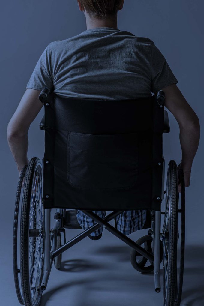 Man in wheelchair from behind