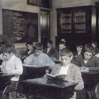 class of immigrants in a night school