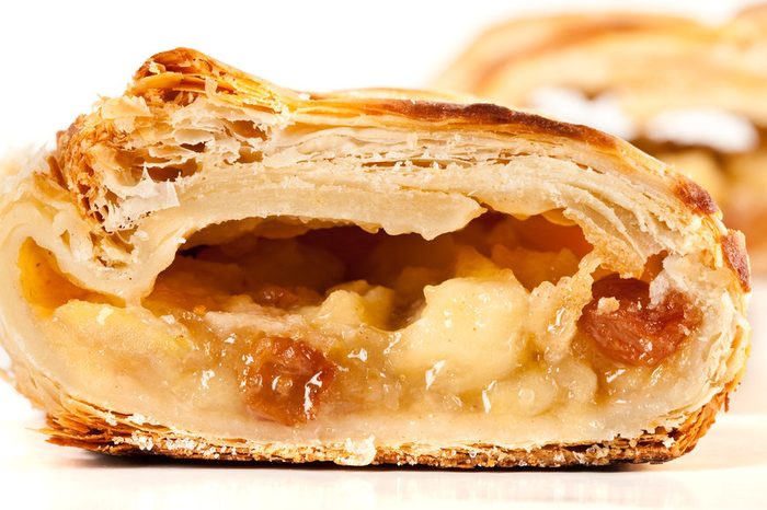 Studio close up of delicious apfelstrudel (apple pie) isolated on white background