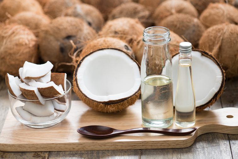 wood spoon and virgin coconut oil. Raw coconut can make virgin oil by cool process centrifuge for good fat no cholesterol . Pure Coconut oil can eat every day and wash or clean cosmetics