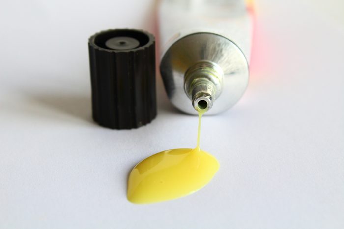 Highly resistant waterproof glue. Universal glue on a white background. Close-up.