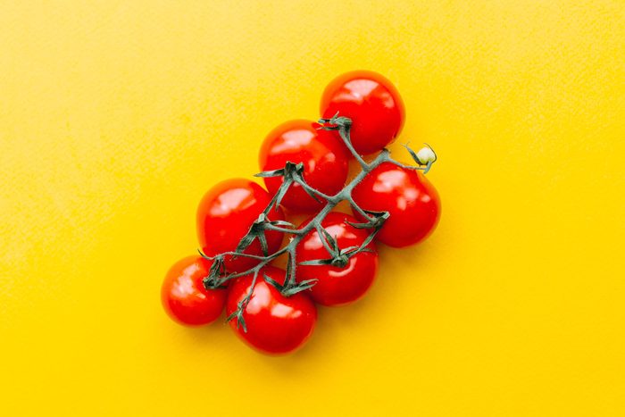 Tomatoes on a yellow background