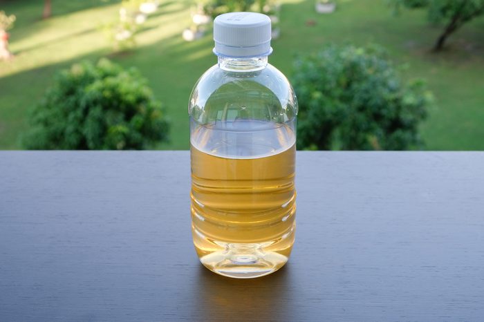 Yellow water in plastic bottles