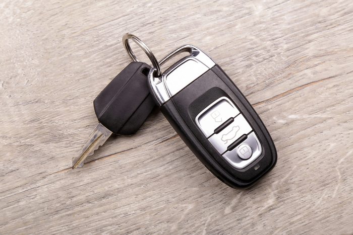 Car key on a wooden background