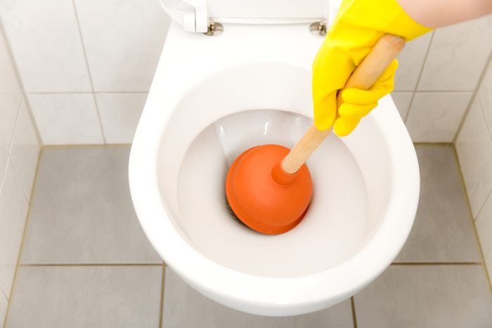 Toilet clogged - bathroom - Plunger