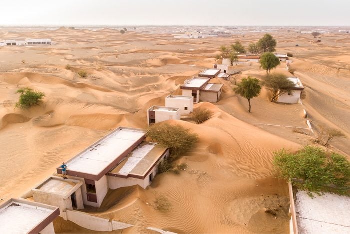 Gettyimages 1022781108 Abandoned Village In A Desert Near Dubai By Katiekk2