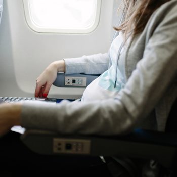Pregnant woman traveling by plane.  Air travel. Is it save to travel during pregnancy?